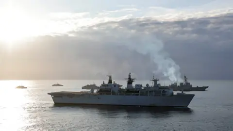 Crown copyright HMS Albion (foreground) with other NATO ships in the Arctic