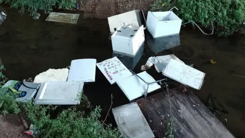 Lilliput Waste Disposal Ltd Fridges dumped in a Grimsby waterway