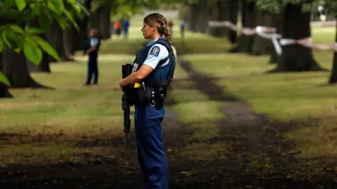 AFP/Getty Officers standing guard near the scene of the New Zealand shooting March 2019