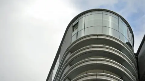 PA Missing window in Corniche apartment block