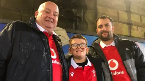 Warren Beck (left) with his son and grandson