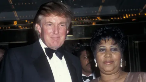 Getty Images Aretha Franklin with Donald Trump in 1997