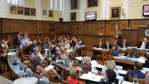 BBC Northamptonshire County Council approved an action plan for "radical" cuts to services