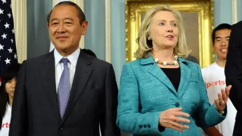 AFP/Getty Images Hillary Clinton (R) speaks next to Japanese ambassador to the US Ichiro Fujisaki, August 2011