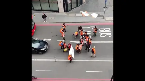 The man pushed the protester to the floor