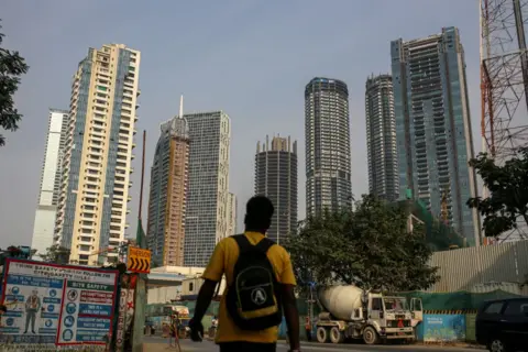 EPA Residential buildings in Mumbai, India, on Monday, Dec. 18, 2023. Wealthy Indians living abroad are snapping up luxury homes in the country, with the investment play driving an unprecedented boom in sales of top-end properties