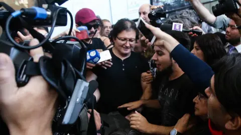 EPA Patricio Ortiz Montenegro is welcomed upon his arrival to Santiago, Chile, 1 February 2019