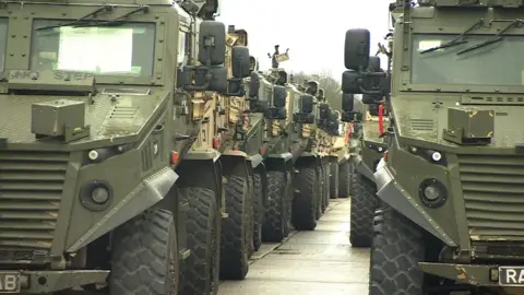 BBC A queue of military vehicles