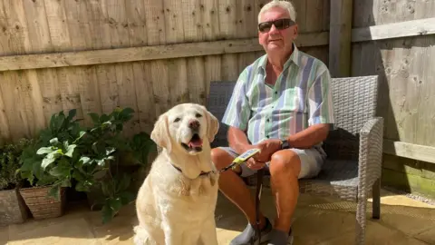 BBC Alan Fletcher with retired guide dog Nutmeg