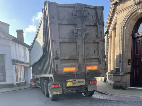Matt Marvel/BBC A lorry going through the centre of Eye