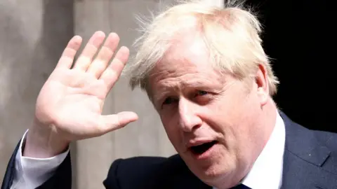 Reuters Boris Johnson pictured outside Downing Street in July