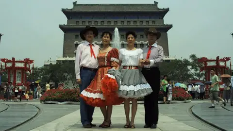 Terry Flaxton A group of people in China