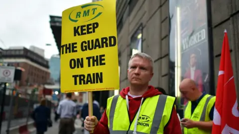 Getty Images Worker on strike