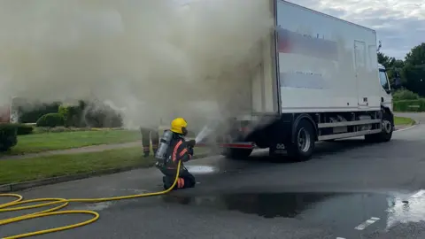 Cambridgeshire Fire and Rescue Smoke coming from a lorry fire in Peterborough