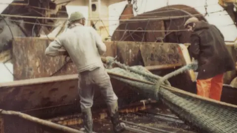 Jerry Thompson Jerry Thompson (left) on-board a trawler as a young man