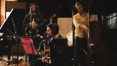 Marcus Haney Mumford & Sons in the studio