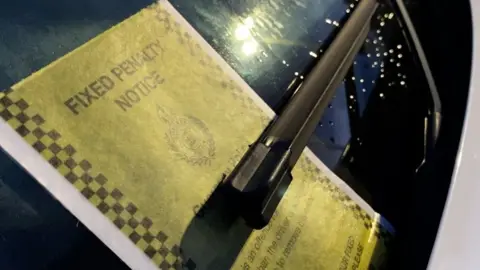 BBC A fixed penalty notice on a car in Guernsey