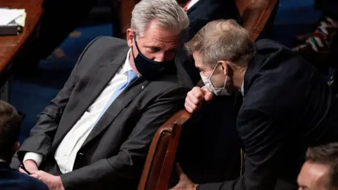 Reuters House Minority Leader Kevin McCarthy (R-CA) and Rep. Jim Jordan (R-OH) talk during a joint session of Congress to certify the 2020 Electoral College results after supporters of President Donald Trump stormed the Capitol earlier in the day, on Capitol Hill in Washington, U.S. January 6, 2021.