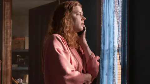 Netflix Amy Adams plays Dr. Anna Fox