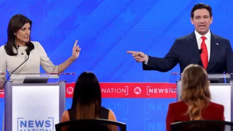 Getty Images Nikki Haley and Ron DeSantis on the debate stage.