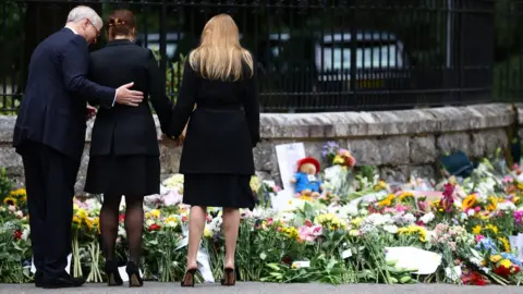 Reuters Prince Andrew and Princesses Eugenie and Beatrice read tributes to the Queen.