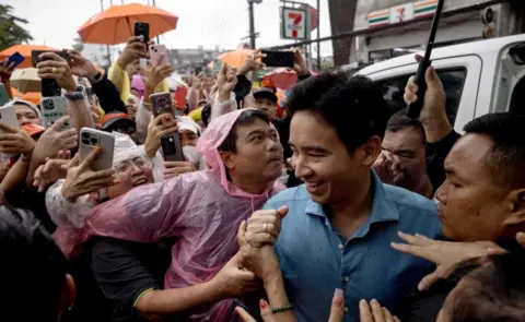 Getty Images Move Forward Party leader and former prime ministerial candidate Pita Limjaroenrat arrives to address a crowd during a rally on Jomtien Beach in Pattaya on July 22, 2023.