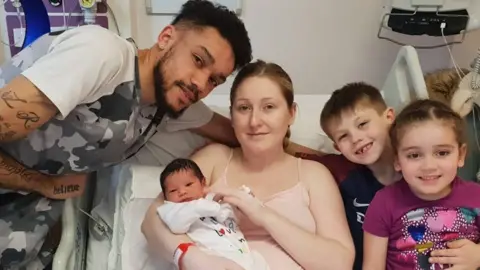 Louis Baker Louis Baker, Laura Baker, Ellis Baker, Riley Baker, 8, and Nyla Baker, 4.