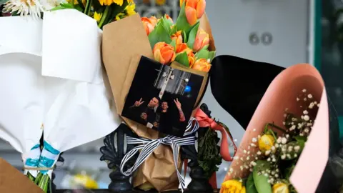 Getty Images Floral tributes are seen at the Paddington residence of Jesse Baird in Paddington, Sydney