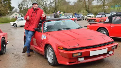 Wayne Scott Wayne Scott with his red Triumph TR8