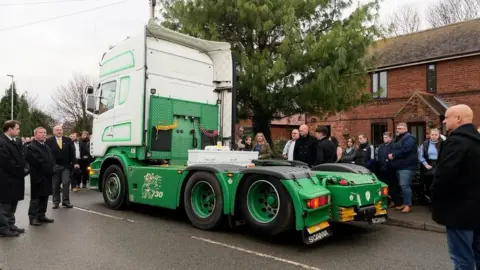 Daisy's coffin on the back of the lorry