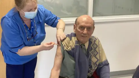 Dumfries and Galloway Health and Social Care Dumfries and Galloway 83-year-old being jabbed