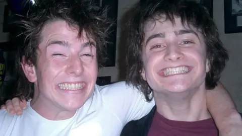 Sky Documentaries David Holmes and Daniel Radcliffe at a party together