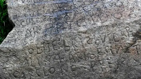 AFP Mystery inscription on rock in the Brittany village of Plougastel-Daoulas, 7 May 19