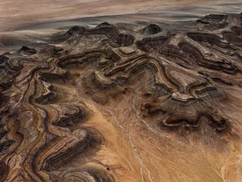 Edward Burtynsky Desert mountains as seen from above