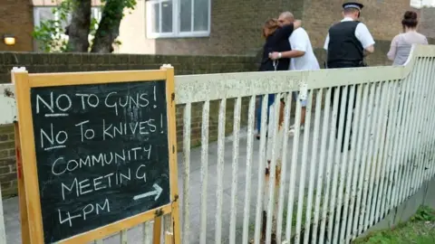 Getty Images Community meeting sign