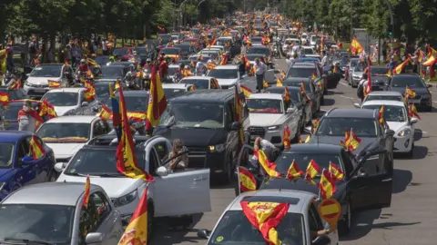 Getty Images Cars take part in the protest against the lockdown