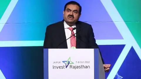 Getty Images Adani Group Chairman Gautam Adani speaks during the Invest Rajasthan Summit 2022, in Jaipur in October 2022