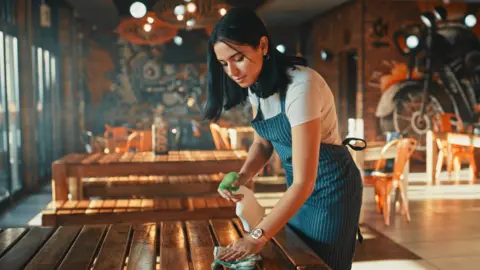 Getty Images Stock image of restaurant worker