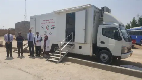 Dr Laith Al Rubaiy Dr Laith Al Rubaiy with colleagues at the mobile unit