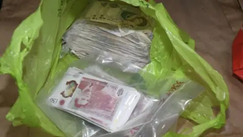 IOM POLICE A bag of criminal cash