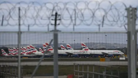 Getty Images BA planes seen behind barbed wire fence