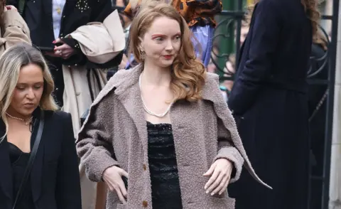 Getty Images Lily Cole arrives for a memorial service to honour and celebrate the life of fashion designer Dame Vivienne Westwood at Southwark Cathedral, London,
