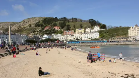 Jeff Buck | Geograph Sandy section of the beach near Llandudno Pier