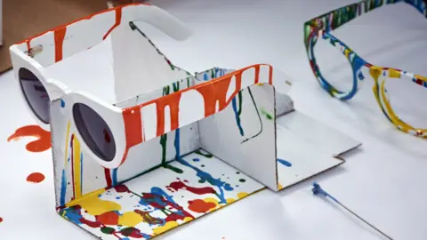 Tom Davies Tom Davies glasses being colour tested