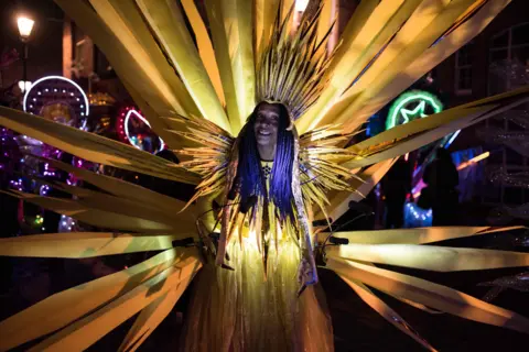 OLI SCARFF/AFP Performers prepare to take part in the Illuminated Night Carnival Parade which features in the annual "Light Night Leeds" festival of visual arts in the centre of Leeds, northern England on 5 October 2017.