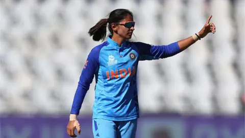 Getty Images Harmanpreet Kaur of India reacts during the ICC Women's T20 World Cup Semi Final match between Australia and India at Newlands Stadium on 23 February 2023 in Cape Town, South Africa