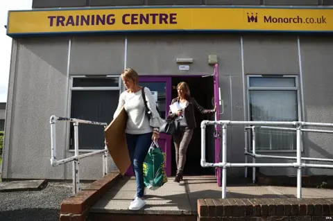 EPA Monarch workers collect their belongings