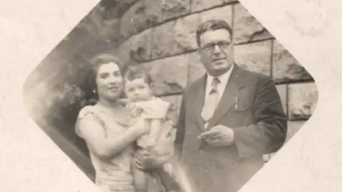 Gabriele Keenaghan Gabriele Keenaghan as a baby in the arms of her mother who is standing next to her father