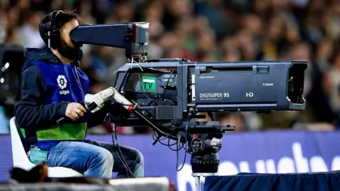Getty Images Cameraman at a La Liga game