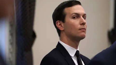 Getty Images Senior White House Adviser and the son-in-law of President Donald Trump Jared Kushner listens to a panel discussion at the Eisenhower Executive Building of the White House in Washington, DC. on 18May 2018